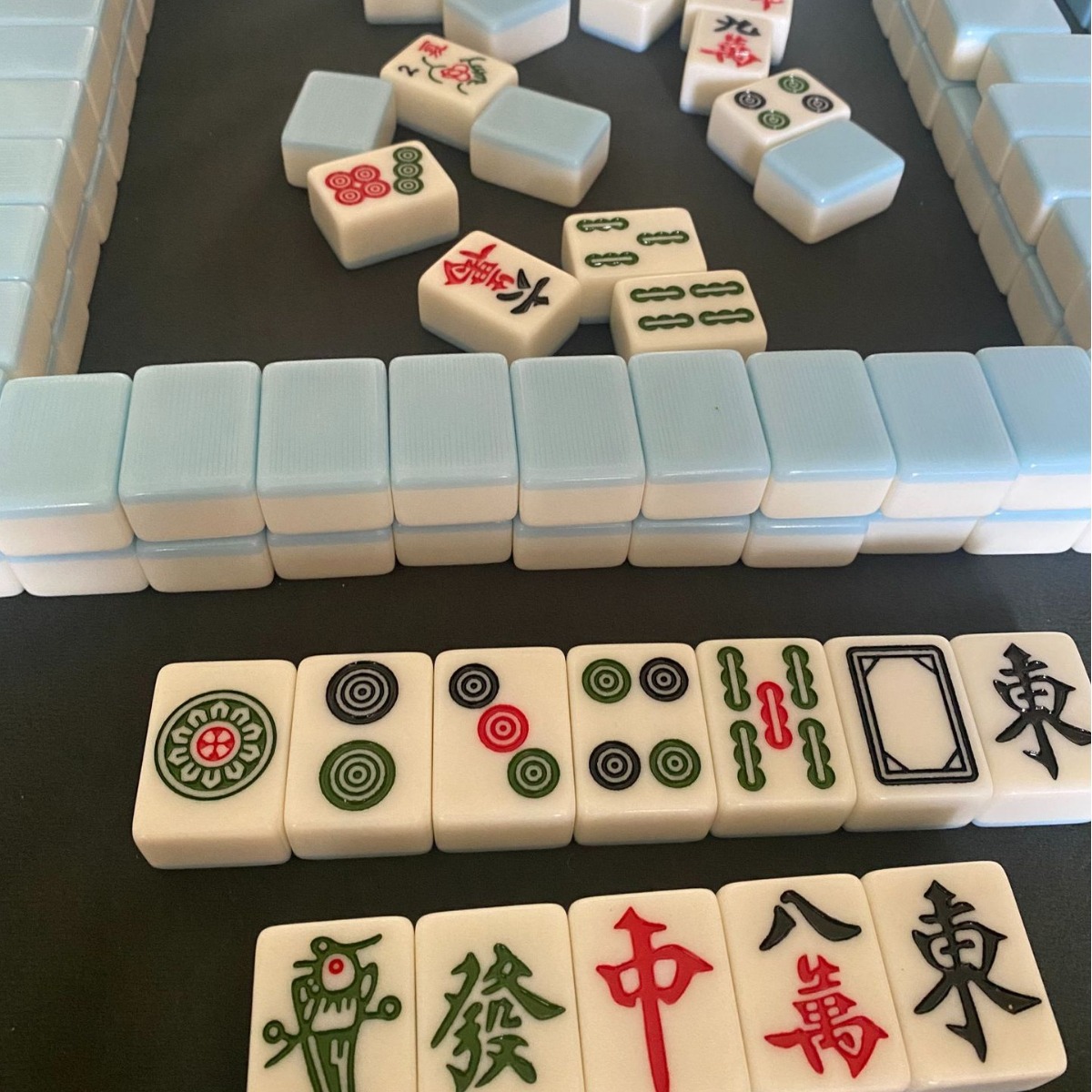 Chinese mahjong tiles, sky blue back